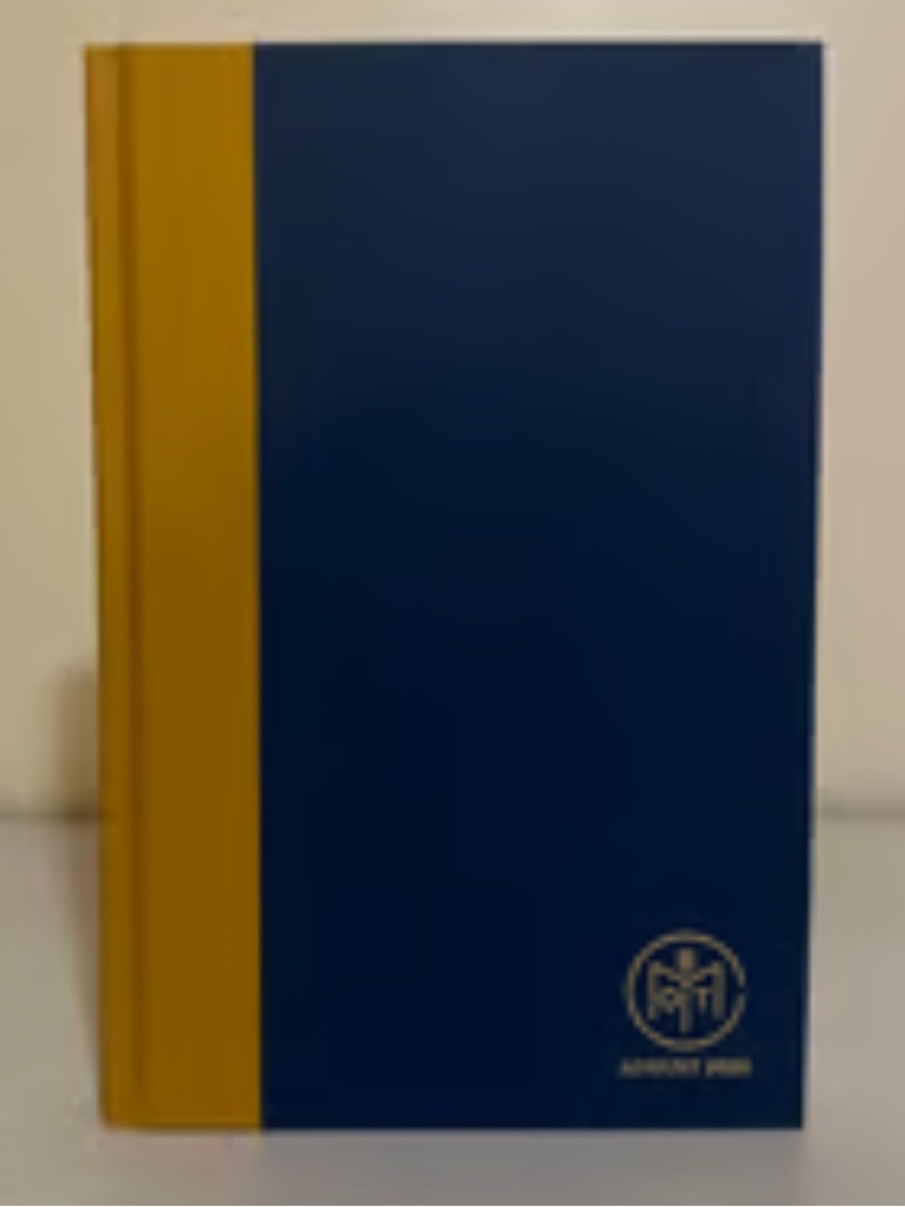 Hardcover Book with Blue and Mustard Yellow Cover